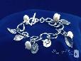 Sterling Silver Pearl, Heart, & Leaf Charm Bracelet