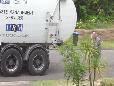 Grandpa and Kid watching Garbage Truck