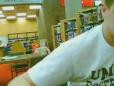 Girl Rocks Out in Library