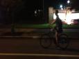 Derek and Jan biking at night