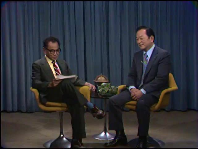 Congressman Antonio Borja Won Pat talks with U.S. Representative Spark M. Matsunaga 8/12/1974