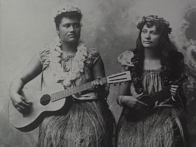 Shots of archival photos; Hawaiians and instruments tape 1
