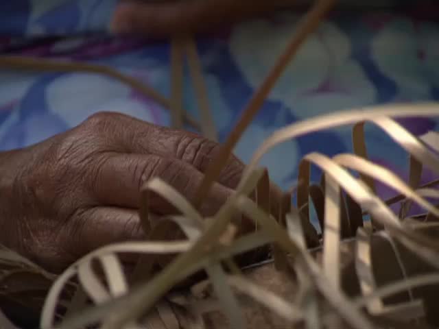 B-roll of Harry and interview with master lauhala weaver Minnie Kaawaloa